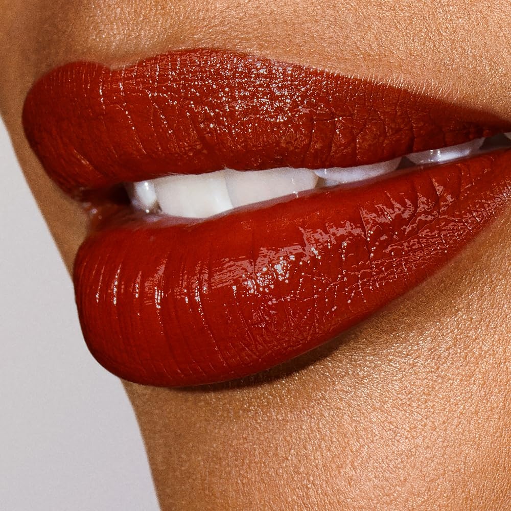 image:imageEste Lauder Pure Color Explicit LongLasting Slick Shine Slim Lipstick for Women Plumping amp Hydrating222 Heat of the Moment A burnt reddish brown with warm undertones