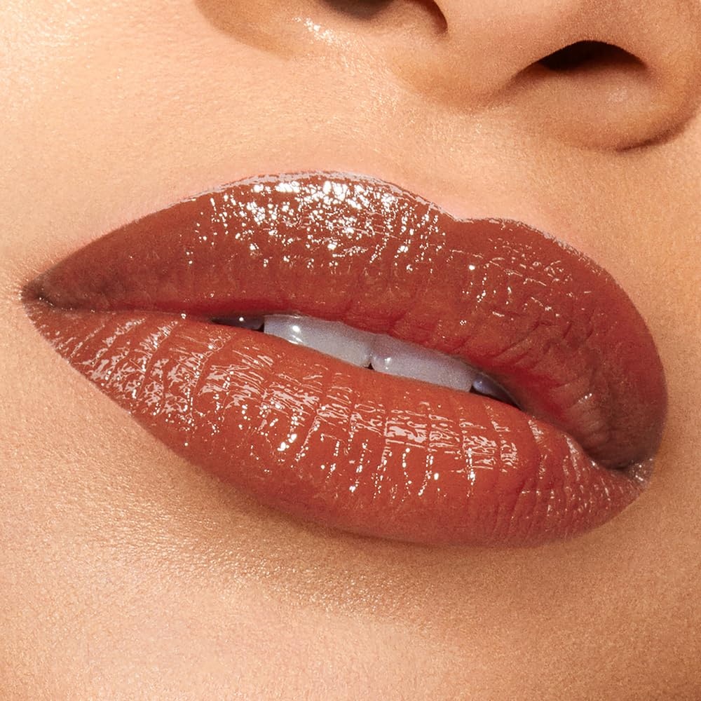 image:imageEste Lauder Pure Color Explicit LongLasting Slick Shine Slim Lipstick for Women Plumping amp Hydrating902 Call 555 A soft caramel with warm undertones