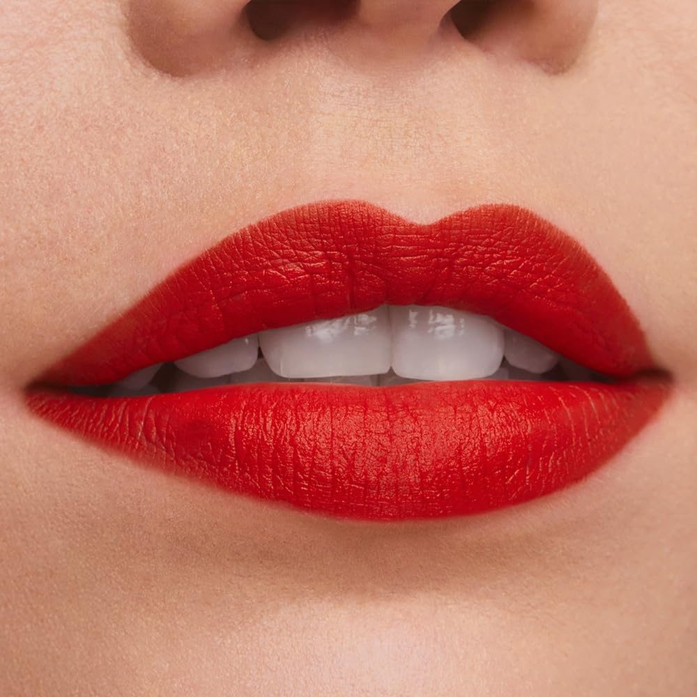 image:imageEste Lauder Pure Color LongLasting Matte Lipstick for Women with Matte Finish Plumping amp Nourishing 012 Ounce667 Deny All A bright orangey red with a warm undertone