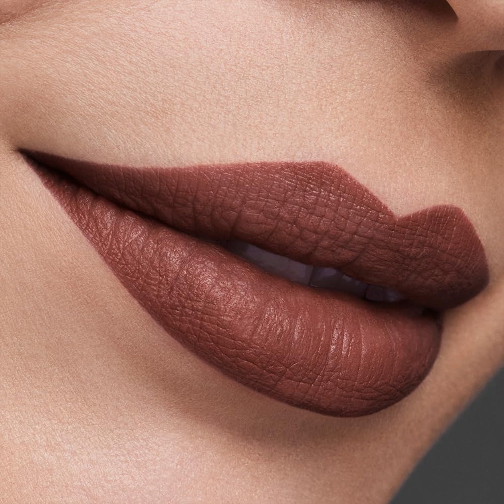 image:imageEste Lauder Pure Color LongLasting Matte Lipstick for Women with Matte Finish Plumping amp Nourishing 012 Ounce829 Expos A light soft brown with a warm undertone