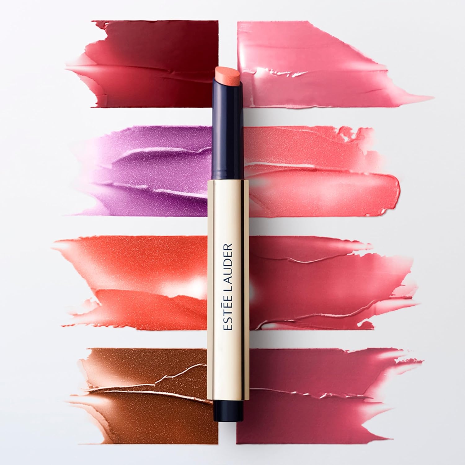 image:imageEste Lauder Pure Color MeltOn Shimmerstick For Lips Plumping amp Moisturizing Lip Gloss Stick415 Sparkling Bellini A shimmering apricot with a golden hued pearl with warm undertones
